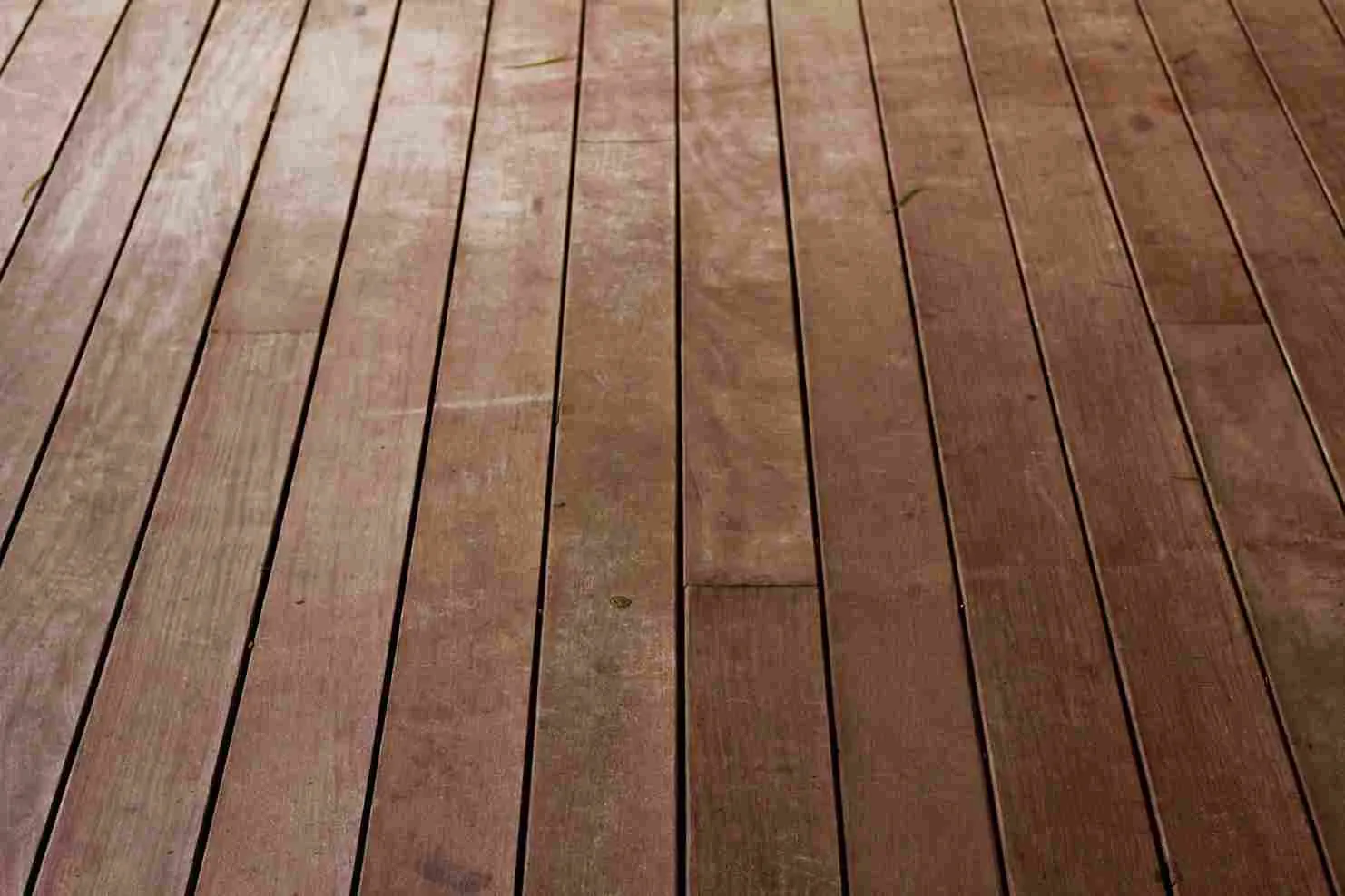 Up close image of an old hardwood floor