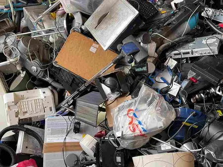 huge pile of old electronics