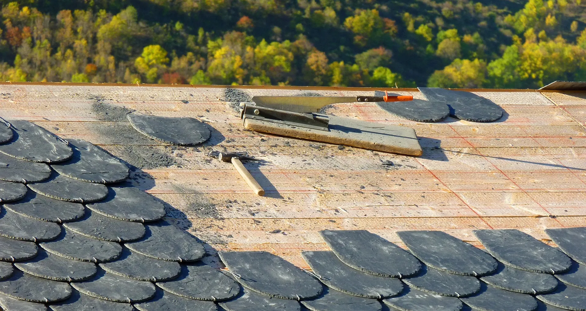 roofing renovation with asphalt shingles