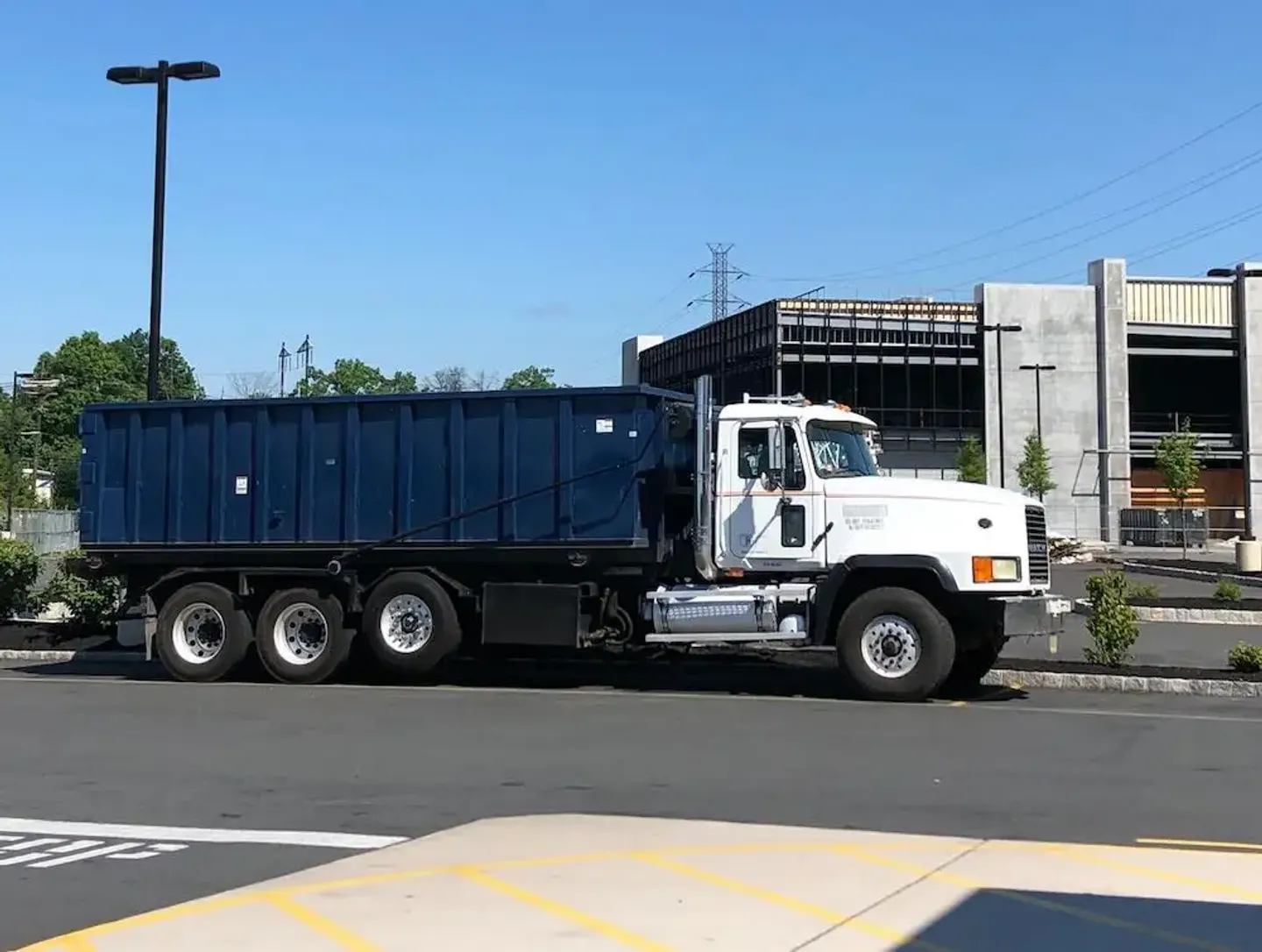 roll off truck and dumpster for asbestos